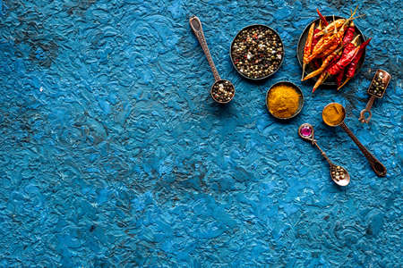 Red hot pepper and paprika - cooking utensils and spices, top viewの写真素材