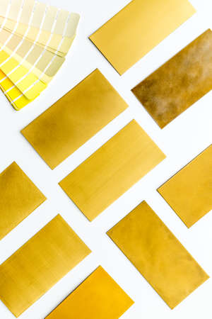 Color scheme with samples of material - kitchen countertops and wooden cabinet. Flat lay