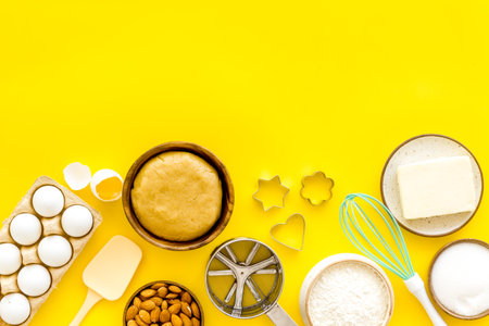 Baking homemade cake or cookie - dough in bowl with ingredients, top viewの写真素材