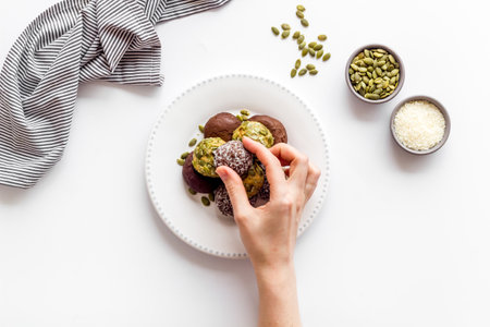 Granola raw energy balls on a plate, top viewの写真素材