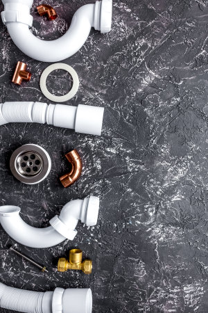 concept plumbing work top view on dark background