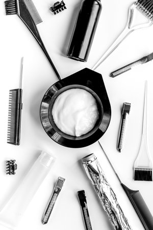 barbershop concept with hairdye tools on white background top viewの写真素材