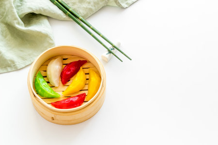 Asian steamed dumplings in wooden steamer. Traditional Chinese dim sum setの写真素材