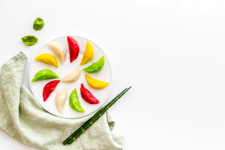 Steamed dumplings tio view. Vegetables ravioli on white plateの写真素材