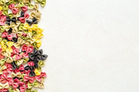 Coloured vegan pasta from beetroot and spinach, top view