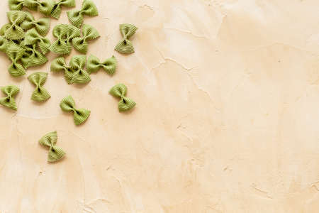 Heap of colored farfalle pasta, top viewの写真素材