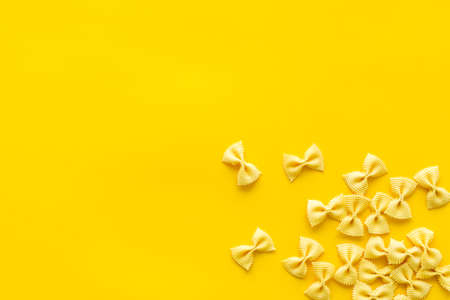 Heap of colored farfalle pasta, top viewの写真素材