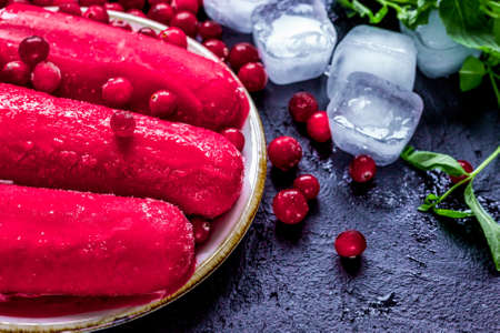 summer dessert  red berries ice creams stone desk backgroundの写真素材