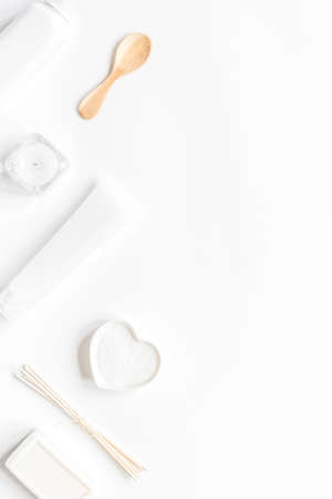 bodycare concept with white set of cosmetics woman desk top view mock-upの写真素材