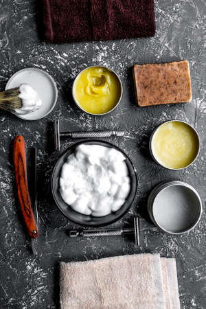 Tools for shaving in barbershop on workplace background top viewの写真素材