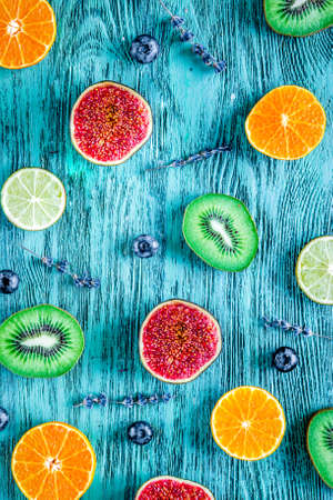 fruit design on blue rustic desk background top view patternの写真素材