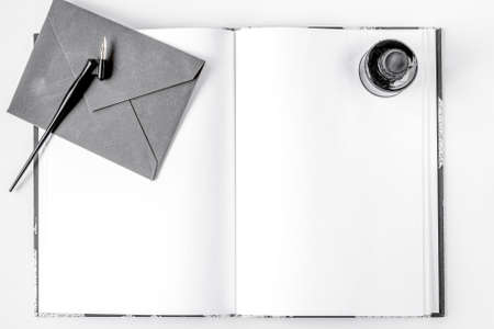 Writer workplace with tools on white background top view mock up
