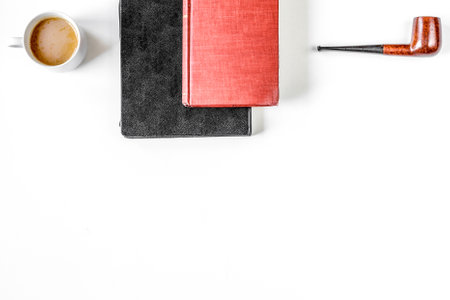 writer workplace with tools on white background top view mockupの写真素材