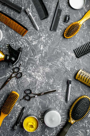 Tools for hairdress in barbershop on gray background top view mock-upの写真素材