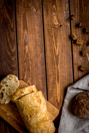 Baking bread ingredients on wooden table background top view mockupの写真素材