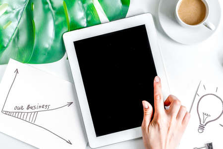 workplace with business plan on white background top view space for textの写真素材