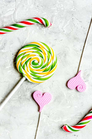 sweets and sugar candies on gray background top view mock-upの写真素材