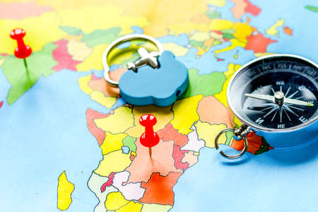 booking travel concept with compass on map backgroundの写真素材