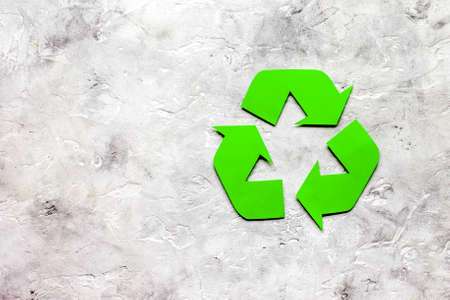 recycling symbol in eco concept on stone background top view mock-upの写真素材