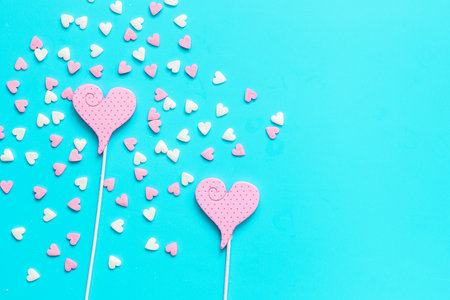 Delicious sugar lollipops on blue background top view space for textの写真素材