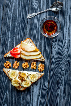 fitness breakfast with homemade sandwiches dark table background top viewの写真素材