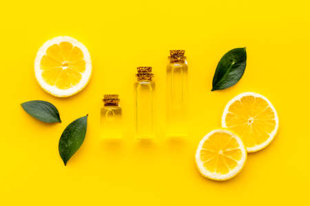 Citrus essential oil vitamin c and lemon slices top viewの写真素材