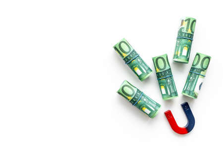 Magnet collecting cash money. Business success conceptの写真素材