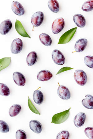 Food pattern - set of purple plums, top viewの写真素材