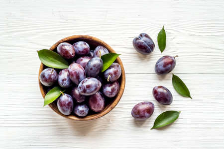 Layout set of ripe purple plums. Top viewの写真素材