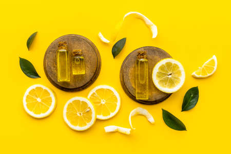Citrus essential oil vitamin c and lemon slices top viewの写真素材