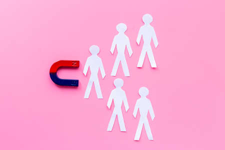 Increase team concept with horseshoe magnet and human figuresの写真素材