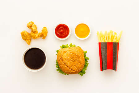 Fast food background. Hamburger chicken nuggets and french friesの写真素材