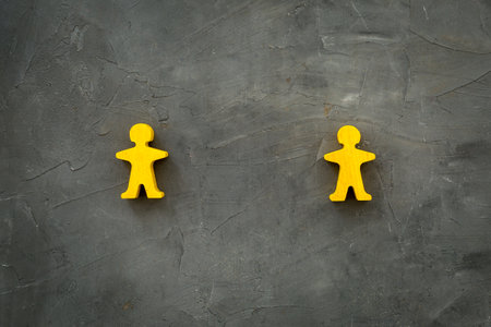 Keep distance concept. Wooden figures on social distancing. Top viewの写真素材