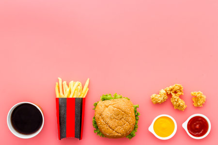 Layout of junk food - french fries burger and chicken nuggetsの写真素材