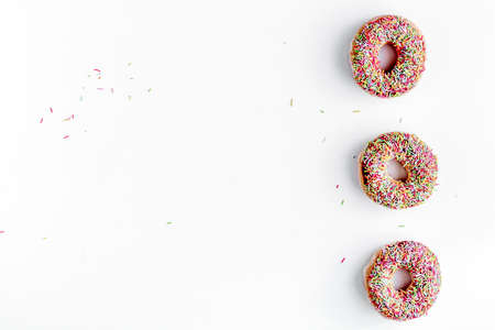 food design with donat set on white table background top view mockupの写真素材