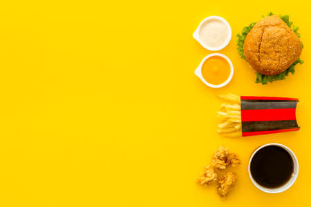 Junk food with hamburger chicken nuggets and french friesの写真素材