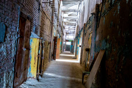 old corridor on the empty abandoned factoryの写真素材