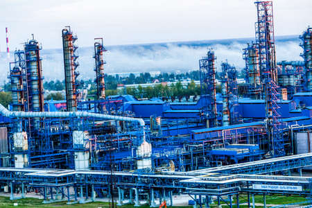 Refinery pipes and buildings - big oil factory