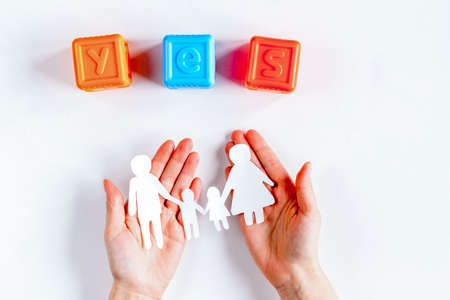 family concept with figures on desk top view mock upの写真素材