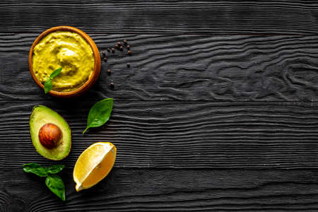 Bowl of guacamole avocado dip. Homemade guacamole cookingの写真素材
