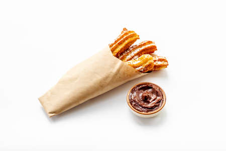 Fast food sweets - churros in paper bag
