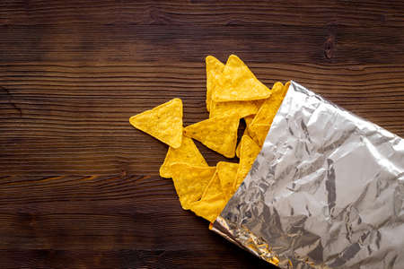 Corn nachos chips from bag. Snacks for party