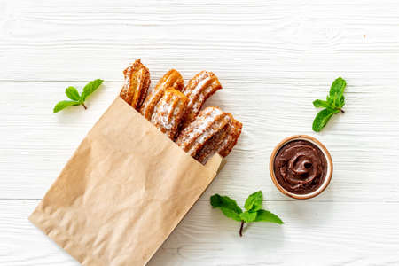 Spanish churros waffles on baking paper, top view
