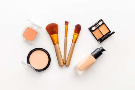 Makeup cosmetic products set with eyeshadow and brushes. Beauty flat lay