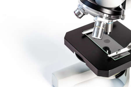 Lens of microscope close up. Research in scientific medical laboratory