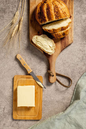 Bread with dried fruits and butter. Healthy home baked loaf top viewの写真素材