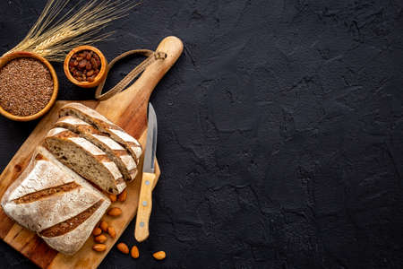 Healthy home baked loaf - bread with dried fruits and nuts