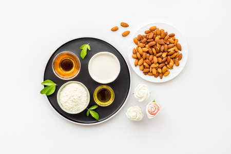 Almond products - oil milk flour with nuts. Organic food and cosmetic backgroundの写真素材