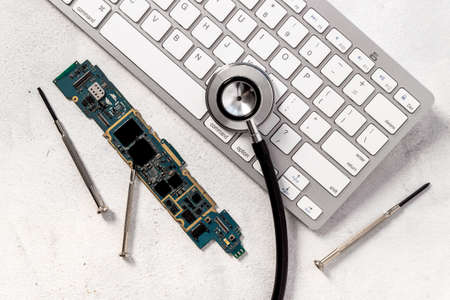 Computer with stethoscope. Tech support or repaire pc system concept