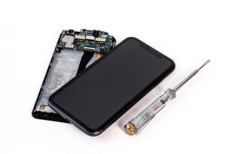 Repairing electronics circuit board - mobile phone with microchips